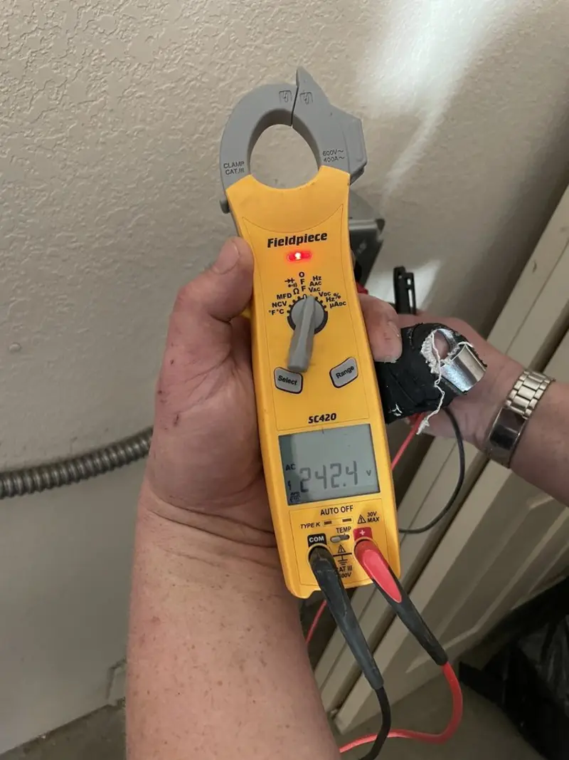 Voltage testing with clamp meter during Generator Installation in Kelseyville
